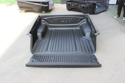 Toyota Hilux საბარგულის ჩასაფენი 2016-2025